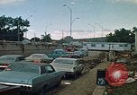 Image of trucks hauling wrecked cars Rapid City South Dakota USA, 1972, second 9 stock footage video 65675052517