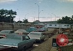 Image of trucks hauling wrecked cars Rapid City South Dakota USA, 1972, second 10 stock footage video 65675052517
