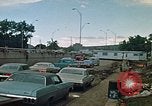 Image of trucks hauling wrecked cars Rapid City South Dakota USA, 1972, second 11 stock footage video 65675052517