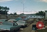 Image of trucks hauling wrecked cars Rapid City South Dakota USA, 1972, second 12 stock footage video 65675052517