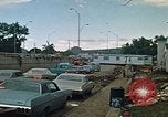 Image of trucks hauling wrecked cars Rapid City South Dakota USA, 1972, second 13 stock footage video 65675052517