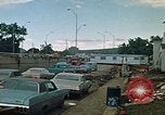 Image of trucks hauling wrecked cars Rapid City South Dakota USA, 1972, second 14 stock footage video 65675052517