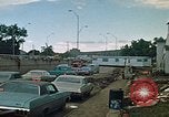 Image of trucks hauling wrecked cars Rapid City South Dakota USA, 1972, second 15 stock footage video 65675052517