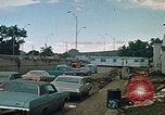 Image of trucks hauling wrecked cars Rapid City South Dakota USA, 1972, second 16 stock footage video 65675052517