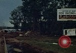 Image of trucks hauling wrecked cars Rapid City South Dakota USA, 1972, second 36 stock footage video 65675052517