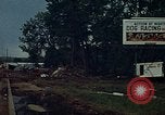 Image of trucks hauling wrecked cars Rapid City South Dakota USA, 1972, second 37 stock footage video 65675052517