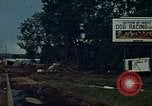 Image of trucks hauling wrecked cars Rapid City South Dakota USA, 1972, second 38 stock footage video 65675052517