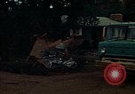 Image of trucks hauling wrecked cars Rapid City South Dakota USA, 1972, second 44 stock footage video 65675052517