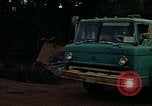 Image of trucks hauling wrecked cars Rapid City South Dakota USA, 1972, second 45 stock footage video 65675052517