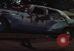 Image of trucks hauling wrecked cars Rapid City South Dakota USA, 1972, second 50 stock footage video 65675052517