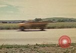 Image of National Guard trucks Rapid City South Dakota USA, 1972, second 1 stock footage video 65675052538