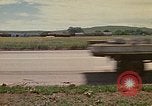 Image of National Guard trucks Rapid City South Dakota USA, 1972, second 25 stock footage video 65675052538