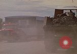 Image of dump trucks Rapid City South Dakota USA, 1972, second 26 stock footage video 65675052542