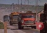 Image of dump trucks Rapid City South Dakota USA, 1972, second 46 stock footage video 65675052542