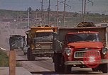 Image of dump trucks Rapid City South Dakota USA, 1972, second 47 stock footage video 65675052542