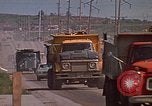 Image of dump trucks Rapid City South Dakota USA, 1972, second 48 stock footage video 65675052542