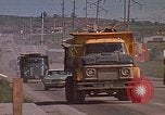 Image of dump trucks Rapid City South Dakota USA, 1972, second 49 stock footage video 65675052542