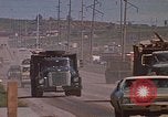 Image of dump trucks Rapid City South Dakota USA, 1972, second 53 stock footage video 65675052542