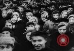 Image of massed crowd parading Moscow Russia Soviet Union, 1924, second 14 stock footage video 65675052607