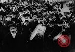 Image of massed crowd parading Moscow Russia Soviet Union, 1924, second 53 stock footage video 65675052607