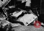 Image of rapid flowing water in streets United States USA, 1955, second 27 stock footage video 65675052615