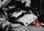 Image of rapid flowing water in streets United States USA, 1955, second 28 stock footage video 65675052615