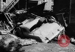 Image of rapid flowing water in streets United States USA, 1955, second 29 stock footage video 65675052615