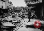 Image of rapid flowing water in streets United States USA, 1955, second 30 stock footage video 65675052615