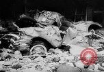 Image of rapid flowing water in streets United States USA, 1955, second 37 stock footage video 65675052615