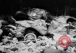 Image of rapid flowing water in streets United States USA, 1955, second 39 stock footage video 65675052615