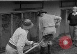 Standbild Männer außerhalb der Häuser Sierra Madre California USA, 1954, aus Sekunde 15 historischem Filmmaterial Videoclip 65675052625