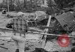 Standbild Männer außerhalb der Häuser Sierra Madre California USA, 1954, aus Sekunde 27 historischem Filmmaterial Videoclip 65675052625