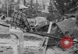 Standbild Männer außerhalb der Häuser Sierra Madre California USA, 1954, aus Sekunde 28 historischem Filmmaterial Videoclip 65675052625