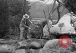 Standbild Männer außerhalb der Häuser Sierra Madre California USA, 1954, aus Sekunde 30 historischem Filmmaterial Videoclip 65675052625