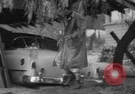 Standbild Männer außerhalb der Häuser Sierra Madre California USA, 1954, aus Sekunde 39 historischem Filmmaterial Videoclip 65675052625