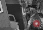 Standbild Männer außerhalb der Häuser Sierra Madre California USA, 1954, aus Sekunde 41 historischem Filmmaterial Videoclip 65675052625