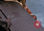 Image of US submarine rescues survivors from Japanese boat Pacific Ocean, 1945, second 3 stock footage video 65675052640