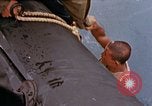 Image of US submarine rescues survivors from Japanese boat Pacific Ocean, 1945, second 5 stock footage video 65675052640