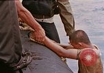 Image of US submarine rescues survivors from Japanese boat Pacific Ocean, 1945, second 8 stock footage video 65675052640