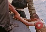 Image of US submarine rescues survivors from Japanese boat Pacific Ocean, 1945, second 9 stock footage video 65675052640