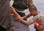 Image of US submarine rescues survivors from Japanese boat Pacific Ocean, 1945, second 10 stock footage video 65675052640