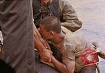 Image of US submarine rescues survivors from Japanese boat Pacific Ocean, 1945, second 12 stock footage video 65675052640
