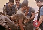 Image of US submarine rescues survivors from Japanese boat Pacific Ocean, 1945, second 13 stock footage video 65675052640