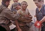 Image of US submarine rescues survivors from Japanese boat Pacific Ocean, 1945, second 18 stock footage video 65675052640