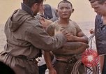 Image of US submarine rescues survivors from Japanese boat Pacific Ocean, 1945, second 19 stock footage video 65675052640