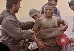 Image of US submarine rescues survivors from Japanese boat Pacific Ocean, 1945, second 20 stock footage video 65675052640