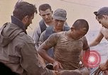 Image of US submarine rescues survivors from Japanese boat Pacific Ocean, 1945, second 22 stock footage video 65675052640