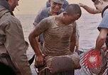Image of US submarine rescues survivors from Japanese boat Pacific Ocean, 1945, second 23 stock footage video 65675052640