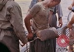 Image of US submarine rescues survivors from Japanese boat Pacific Ocean, 1945, second 24 stock footage video 65675052640
