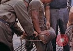 Image of US submarine rescues survivors from Japanese boat Pacific Ocean, 1945, second 26 stock footage video 65675052640